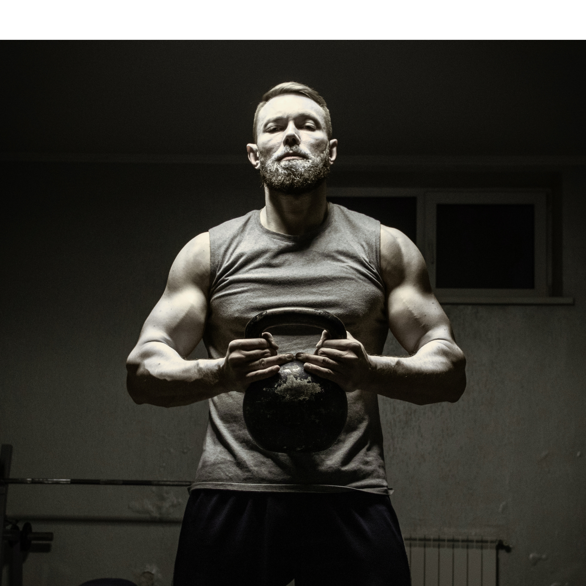 Strength athlete holding a kettlebell